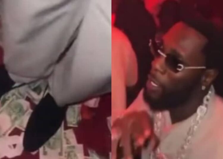 Video of Burna Boy stepping on Naira notes while dancing at a nightclub got viral on the internet